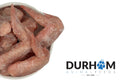 Durham Animal Feeds Chicken Wings - raw pieces beside the Durham Animal Feeds logo.