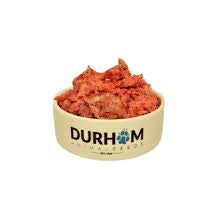 Durham Animal Feeds Chicken Dinner Meat Only - raw food pictured in a bowl beside Durham branding.
