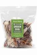 Pure & Natural Doggy Bag, a clear resealable bag of mixed natural dog treats with a green label.