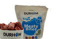 Durham Animal Feeds Tripe Meaty Bites – 1kg - blue-labelled Tripe Meaty Bites bag beside a bowl of frozen bites.