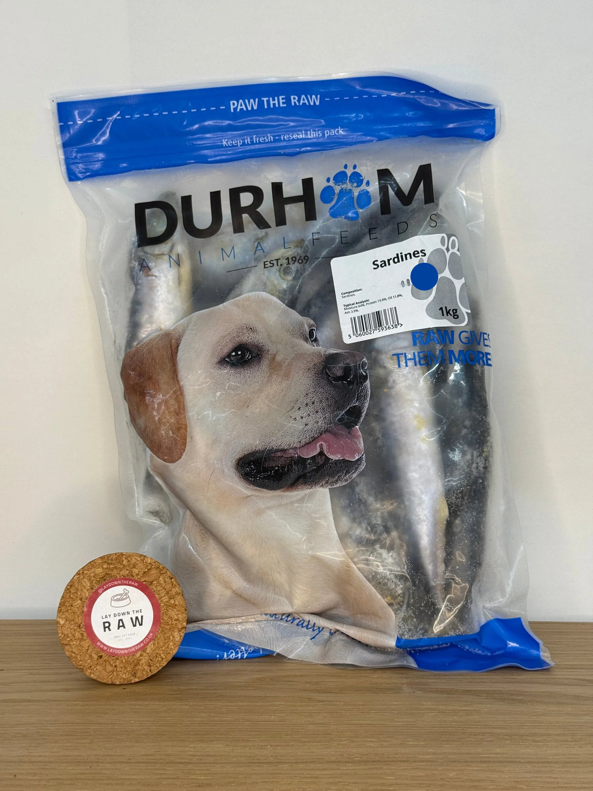 Durham Animal Feeds Sardines – 1kg - blue and clear bag containing whole frozen fish.